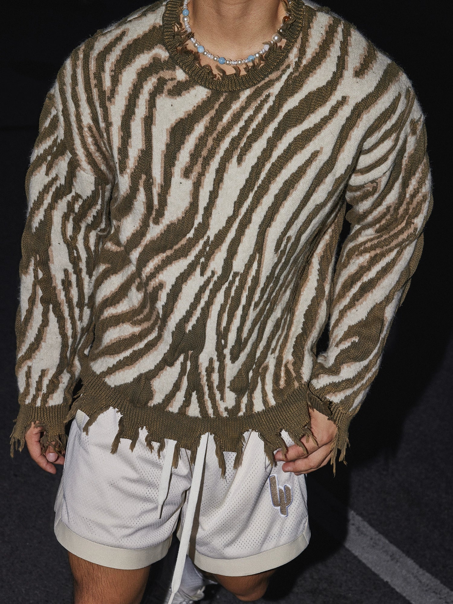 Wild Stripes Distressed Knit Sweater