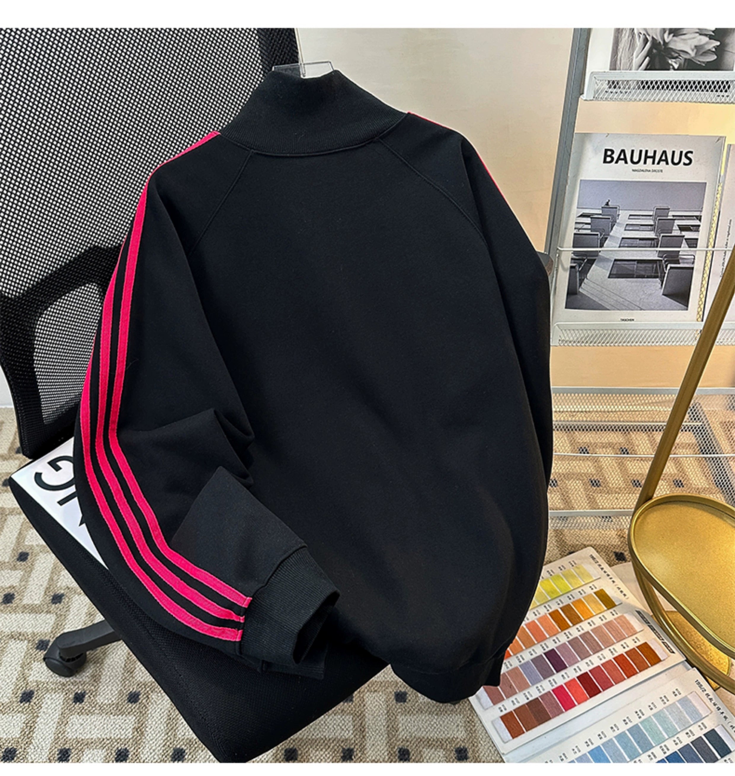 Black Track Jacket with Red Stripes and White Graphic Lettering