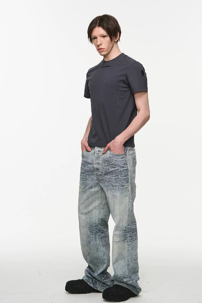 Whiskered Washed Digital Logo Jeans - chiclara