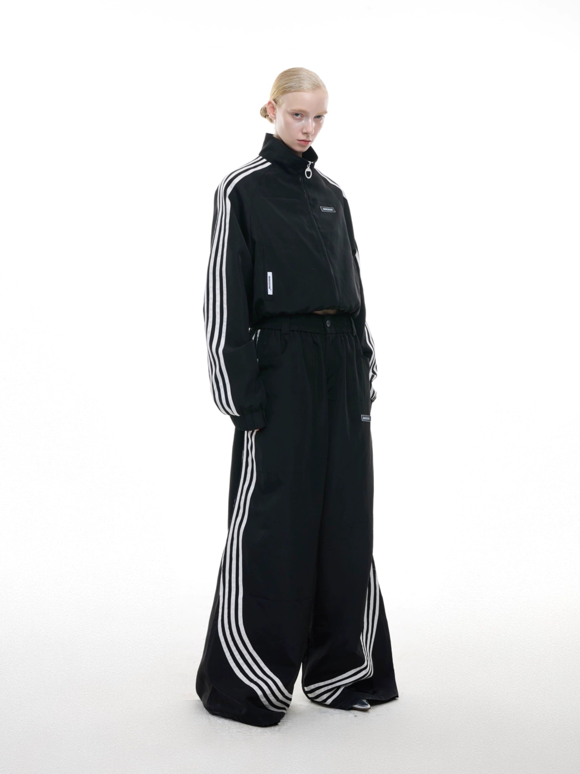 Black Track Jumpsuit with White Stripe Detail