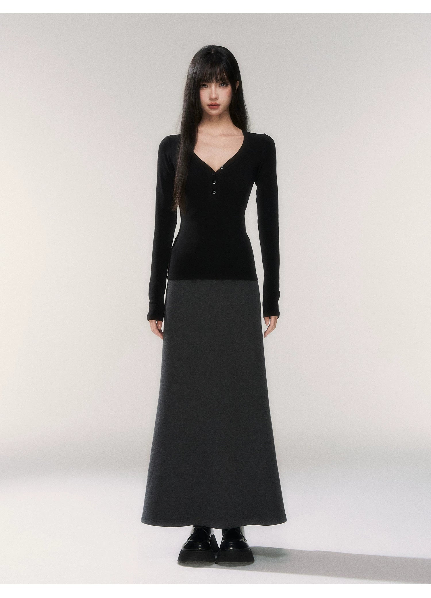 Noir Silhouette Buttoned V‑Neck Top