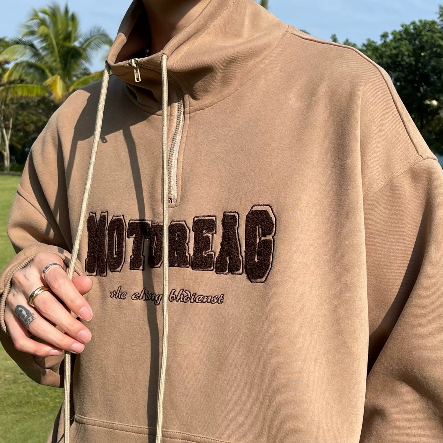 Quarter-Zip Mock Neck Sweatshirt with Embroidered Text
