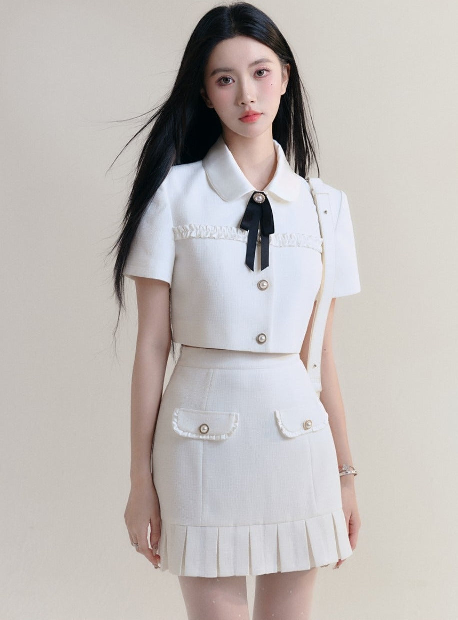 Ivory Elegance Bow-Tie Crop Blouse and Pleated Mini Skirt Set