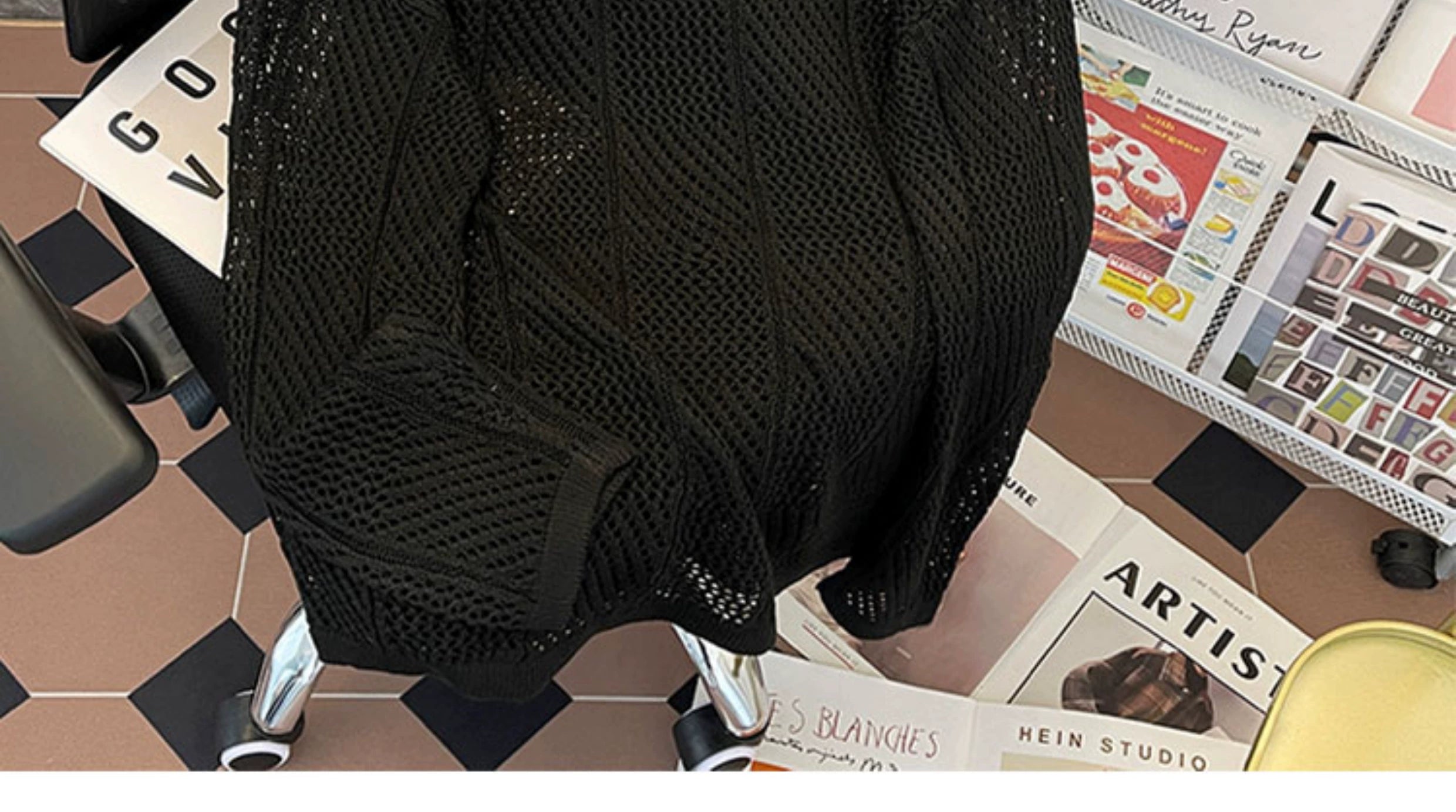 Oversized mesh knit sweater with a drawstring neckline