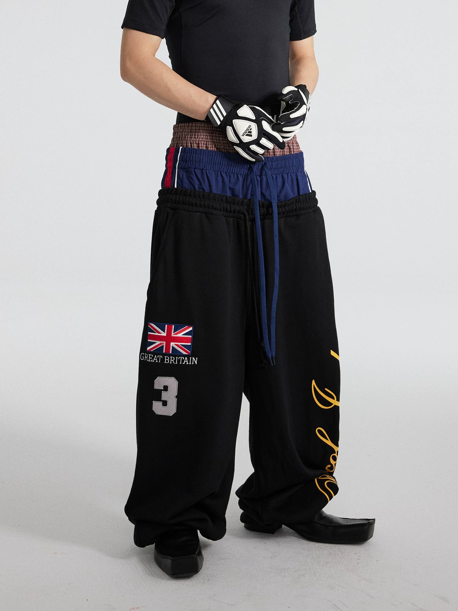 Union Stack Triple-Waist Track Flares
