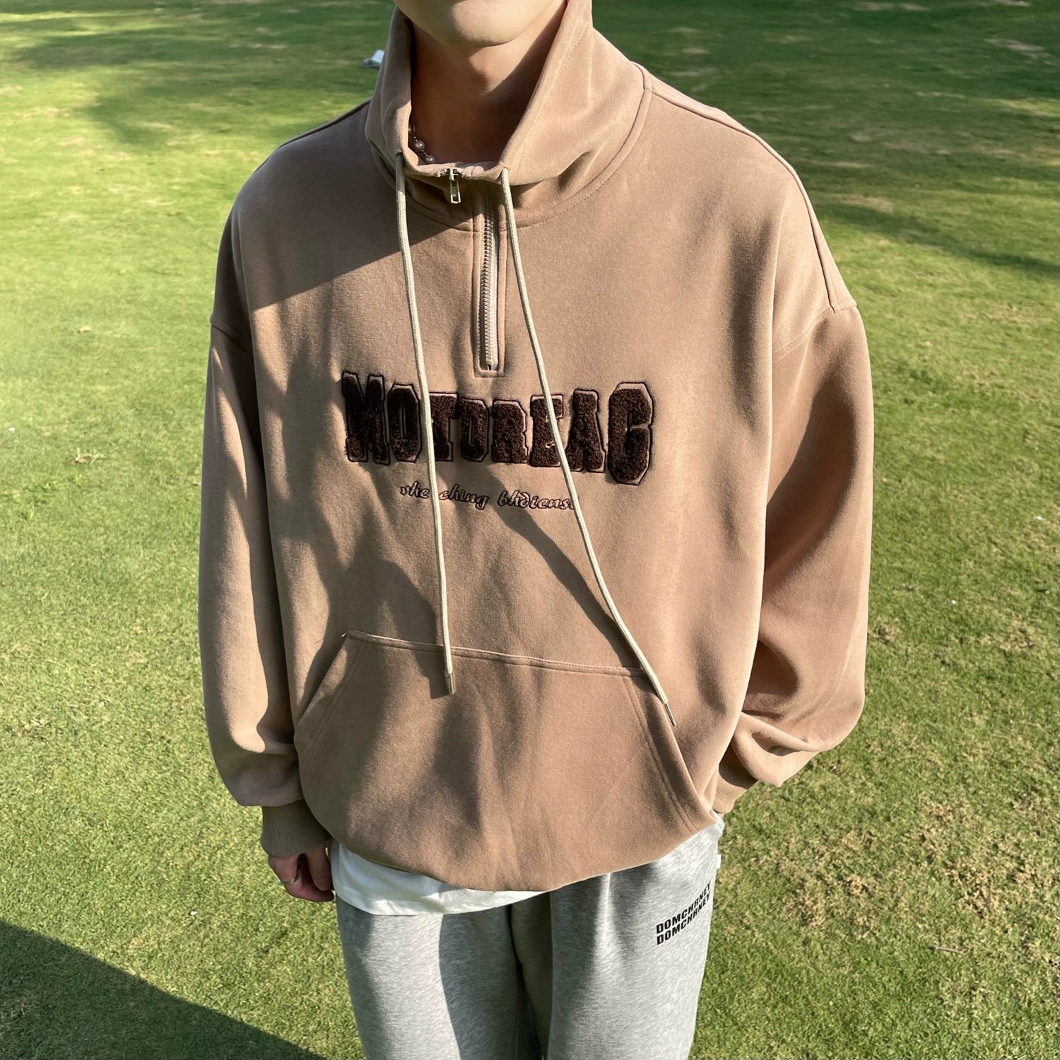 Quarter-Zip Mock Neck Sweatshirt with Embroidered Text