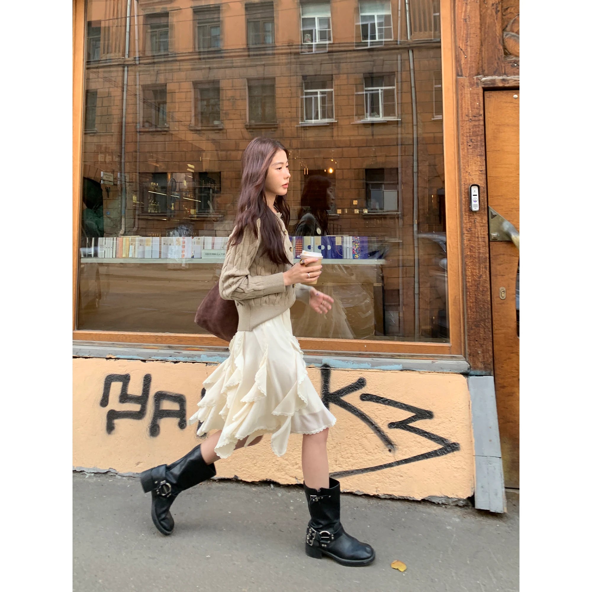 White asymmetric ruffle mini skirt with boots