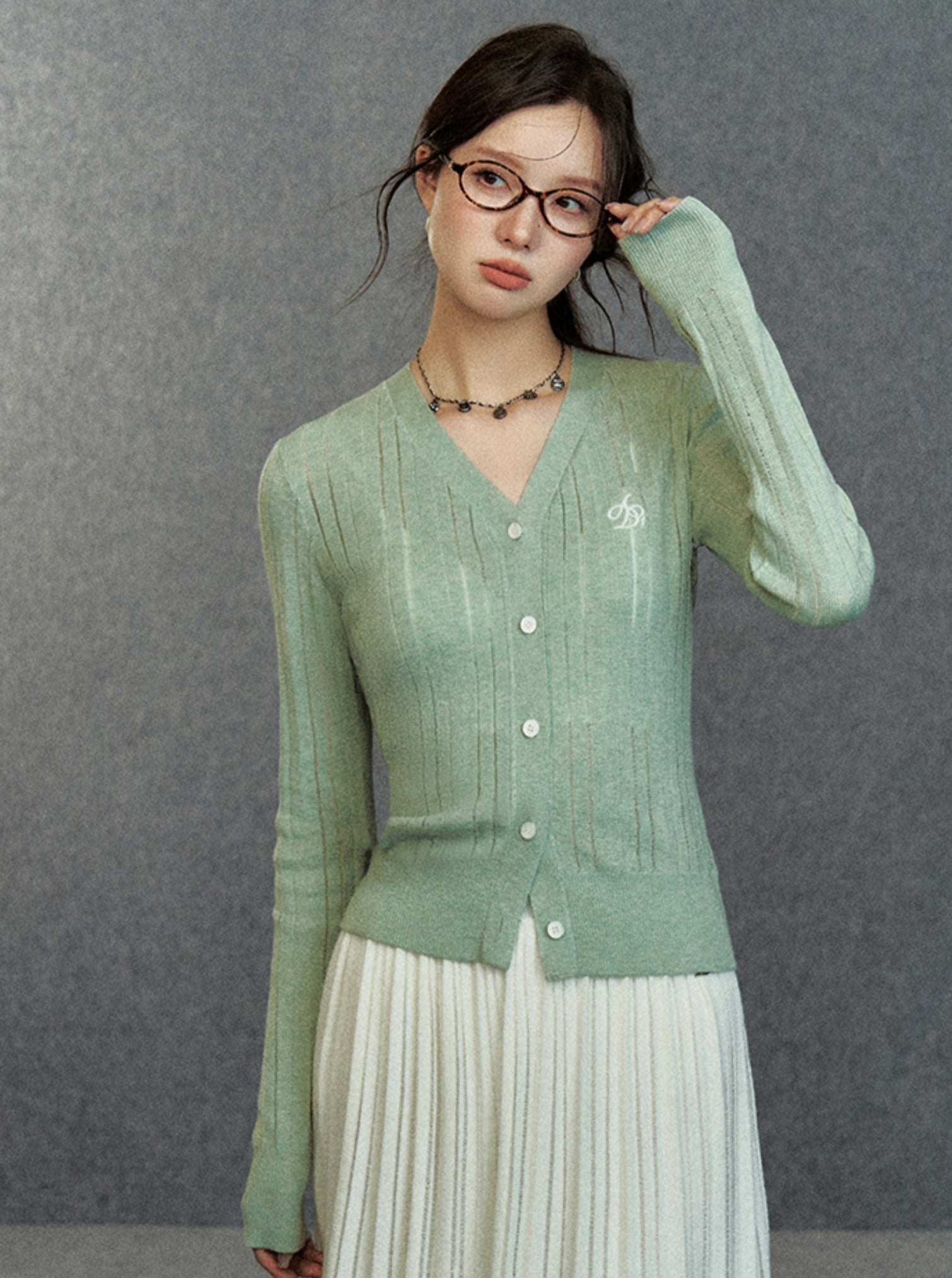 Elegant Ribbed Cardigan: Classic V-Neck with Signature Embroidery