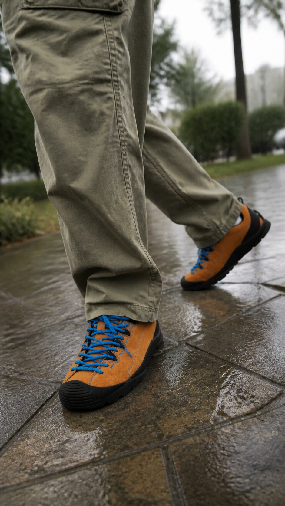 Canyon Trail Suede Sneakers on a damp urban park path