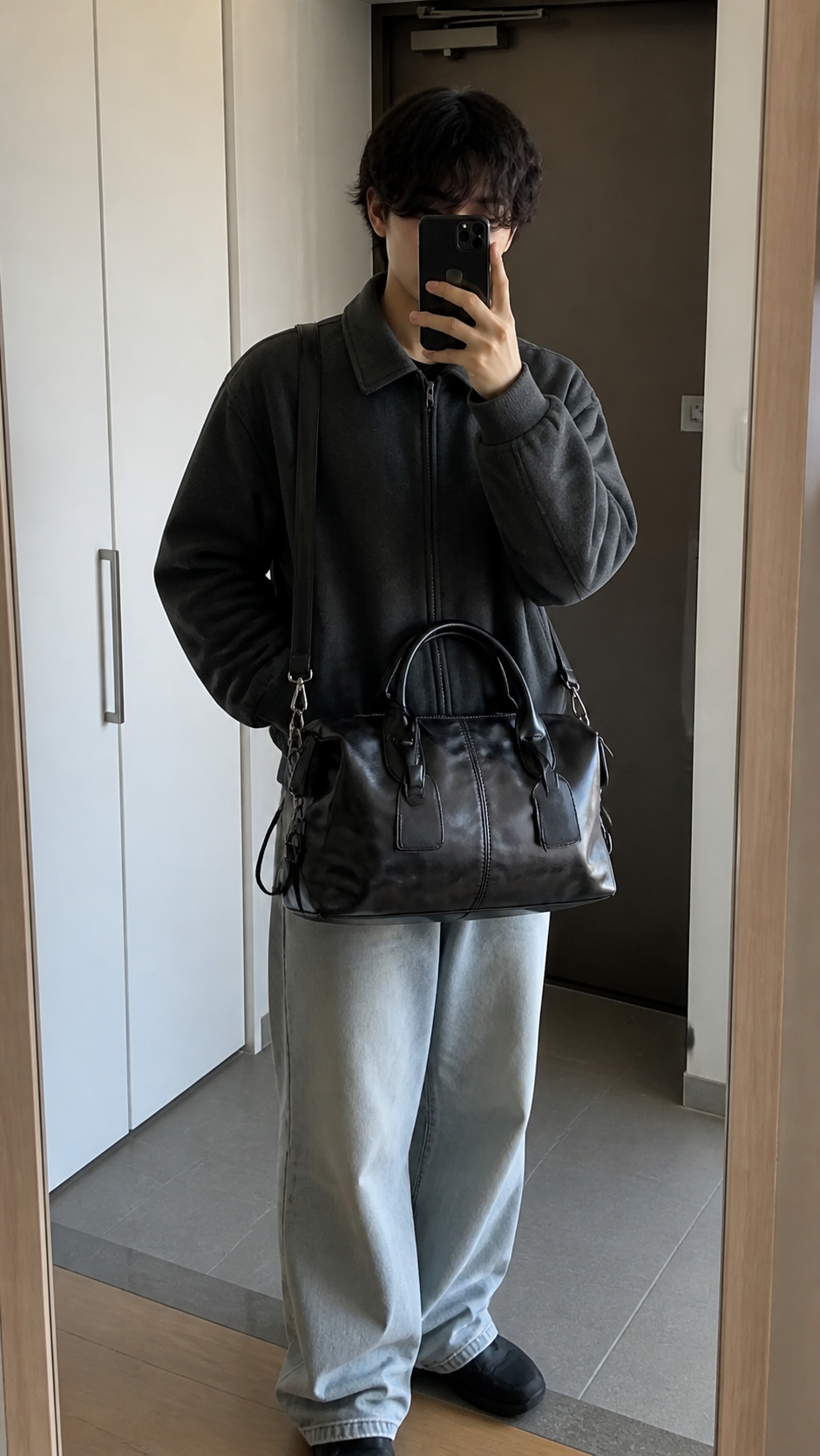 Midnight Transit Leather Weekender in a natural apartment mirror outfit