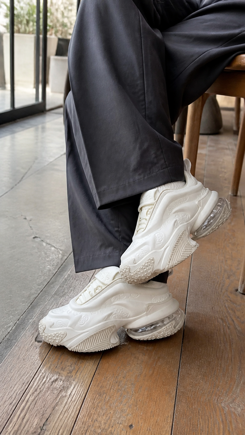 White Vortex Embossed Platform Sneakers in a casual cafe outfit