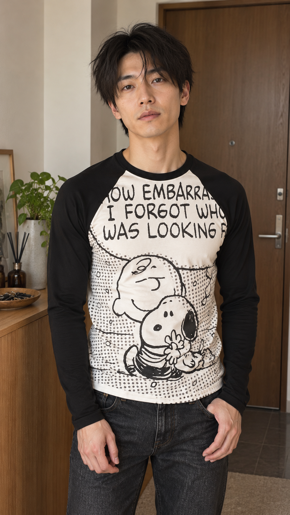AI-styled showcase 2: Comic-Graphic Raglan Stretch T-Shirt in black, casual everyday outfit.