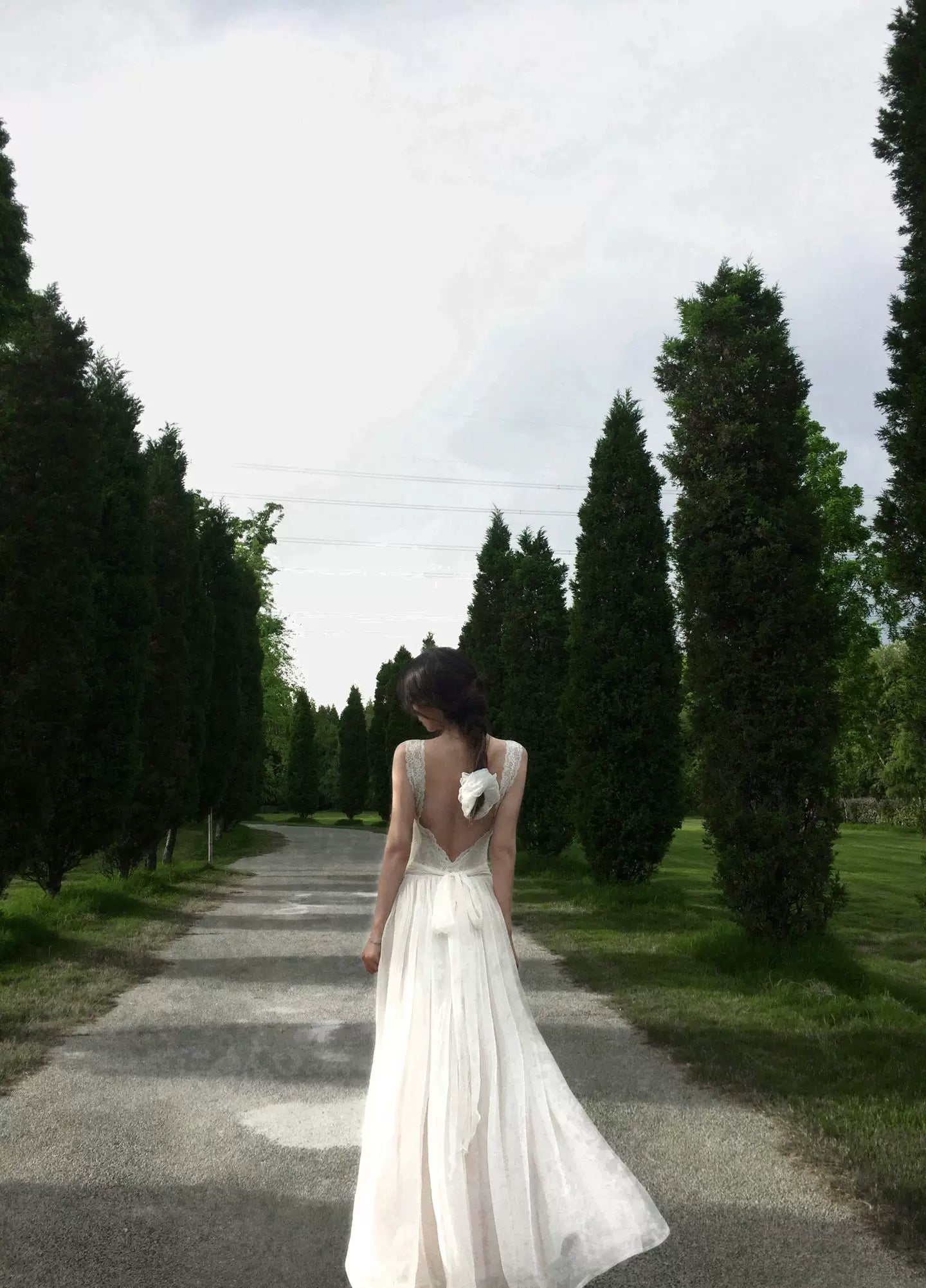 Ivory lace open-back maxi dress, back view