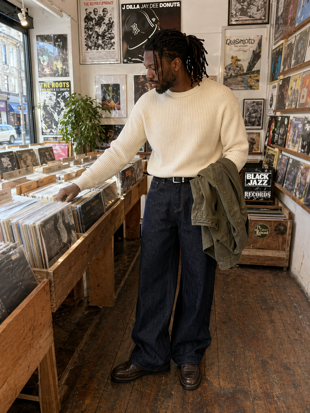 UGC showcase 2 for Midnight Dock Loose Denim Pants: Black British man in a record shop.