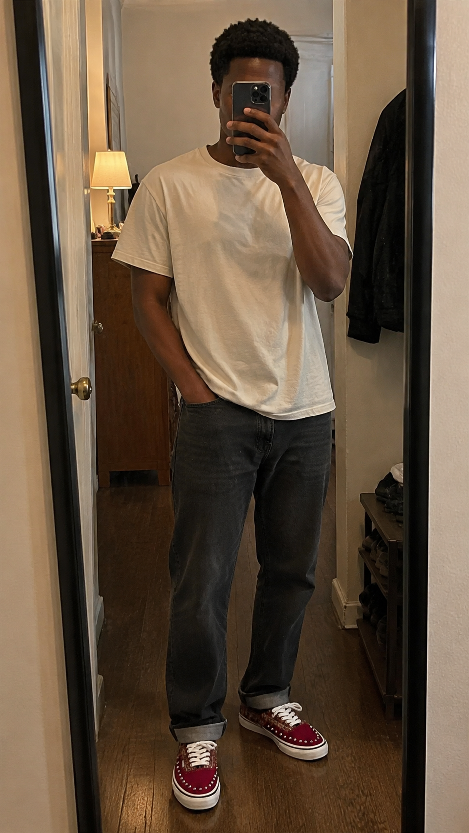 Reddish-brown studded suede low-top sneakers in an apartment mirror outfit photo