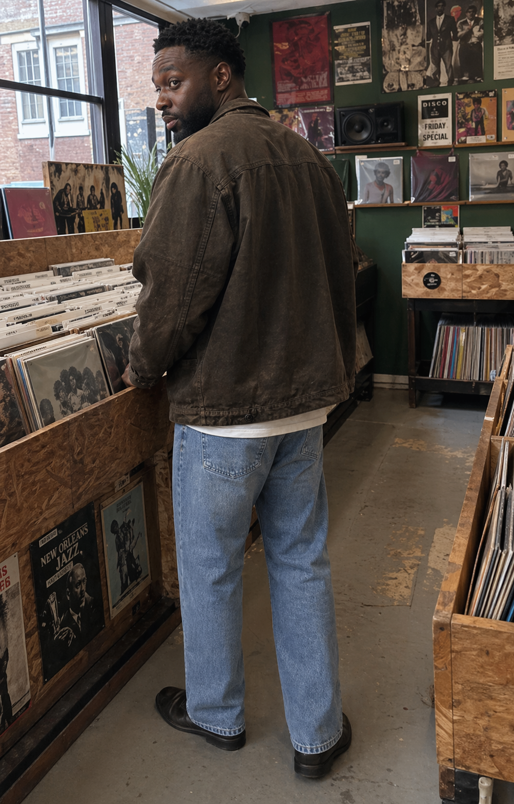 UGC showcase 3 for Skyfade Straight Leg Jeans: Black British man in a London record shop.