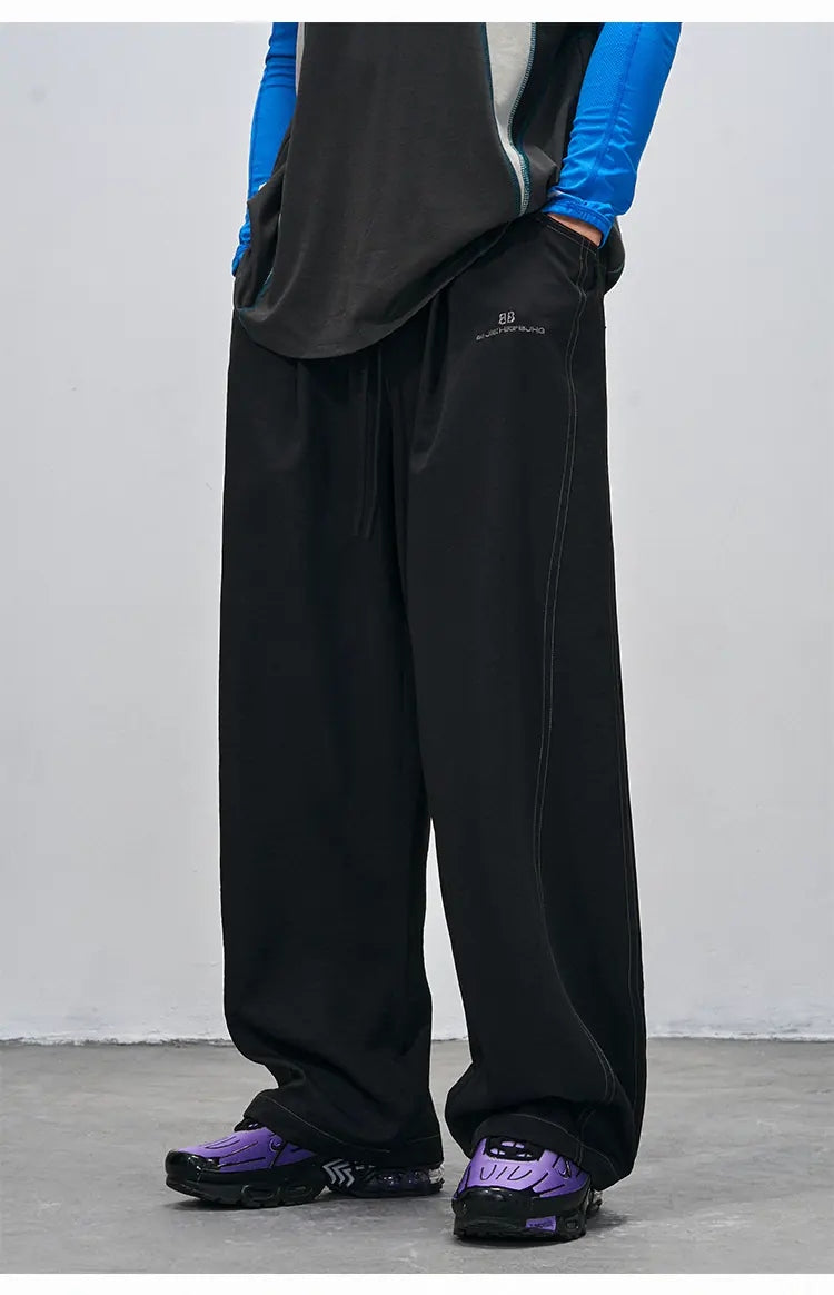 Minimal Embroidered Wide-Leg Trousers product view 6