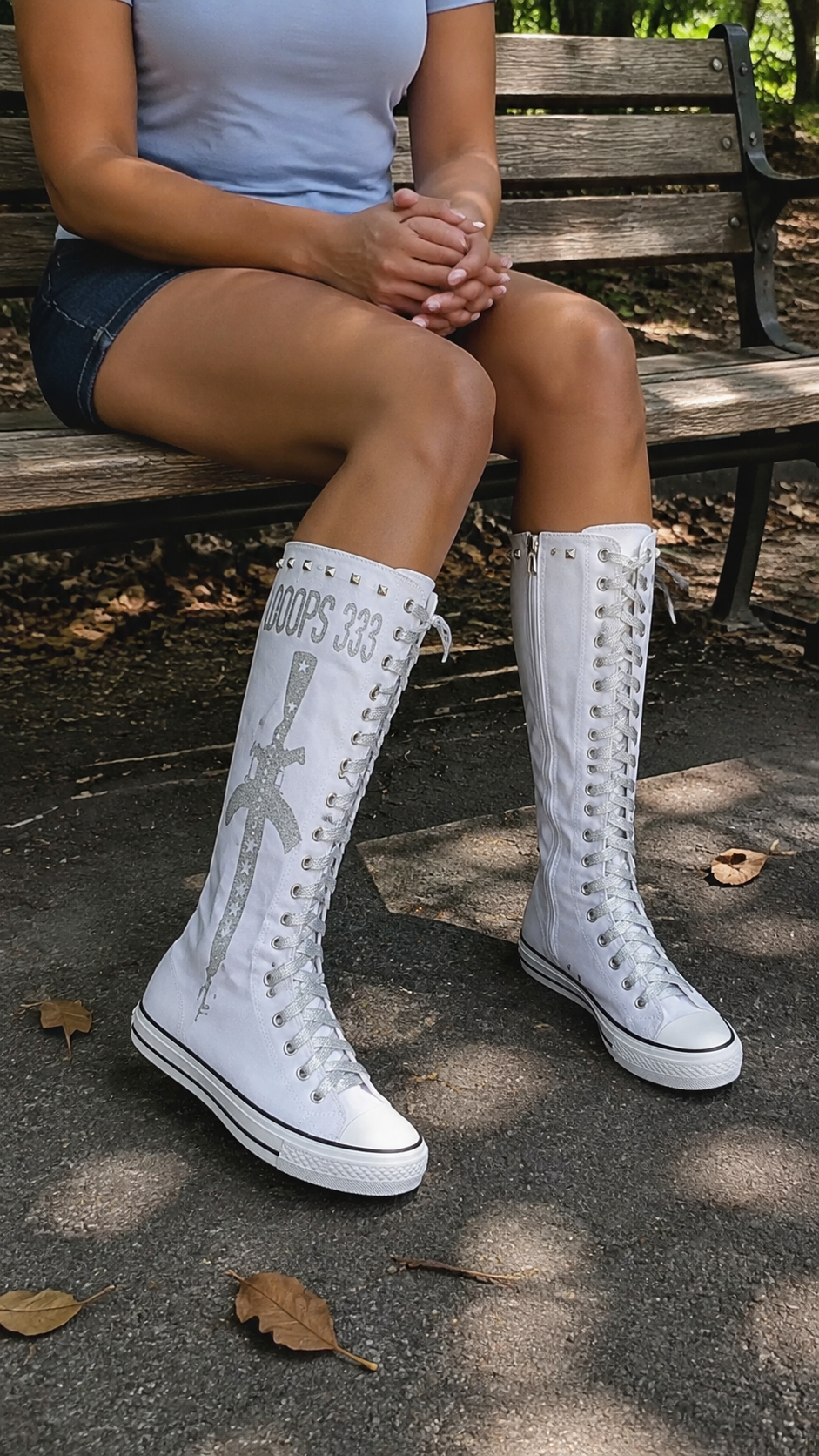 Studded Graphic Canvas Knee-High Boots — White — park bench; AI-generated lifestyle showcase