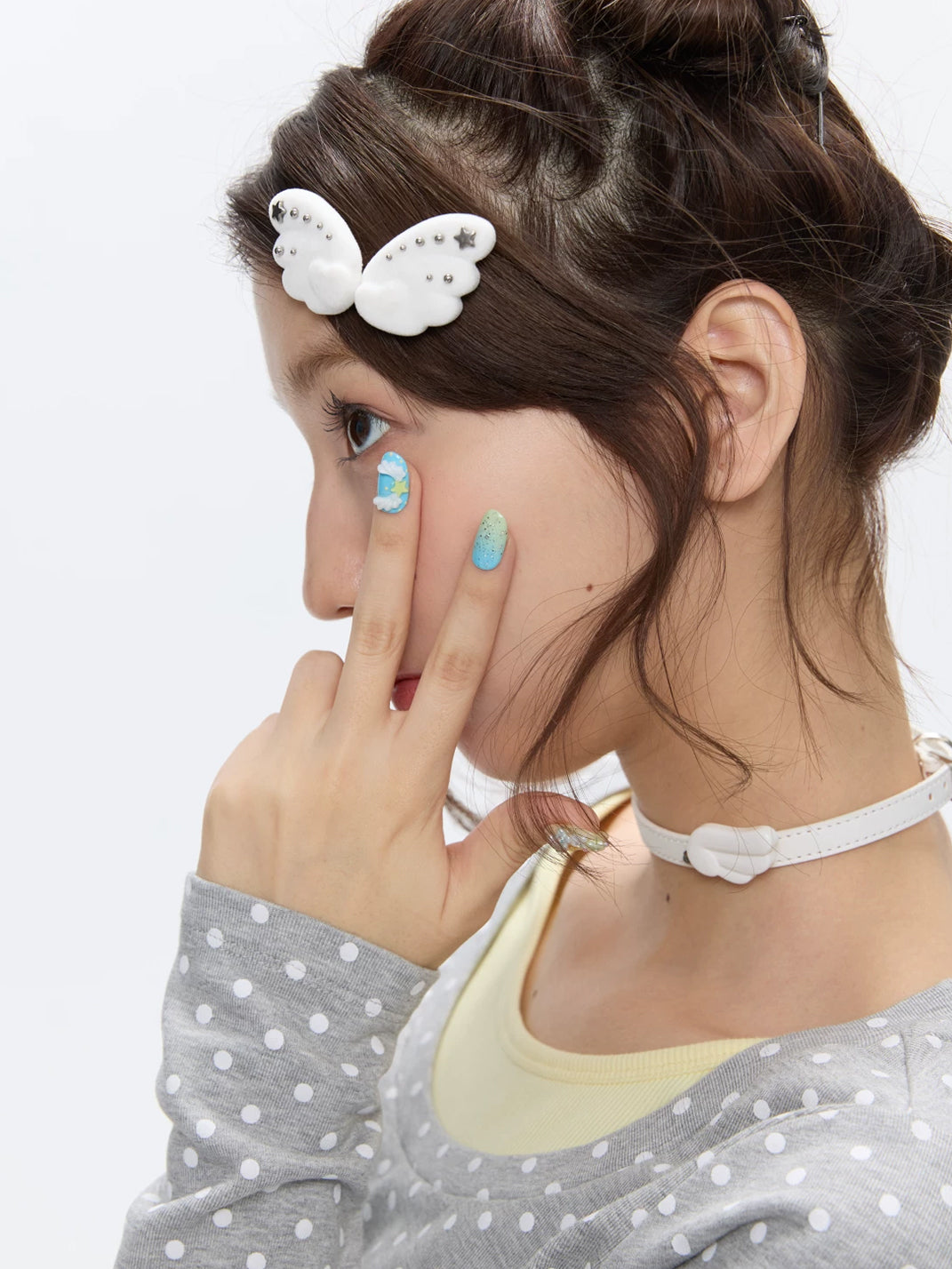 White Flocked Wing Hair Clip Pair — product view 4
