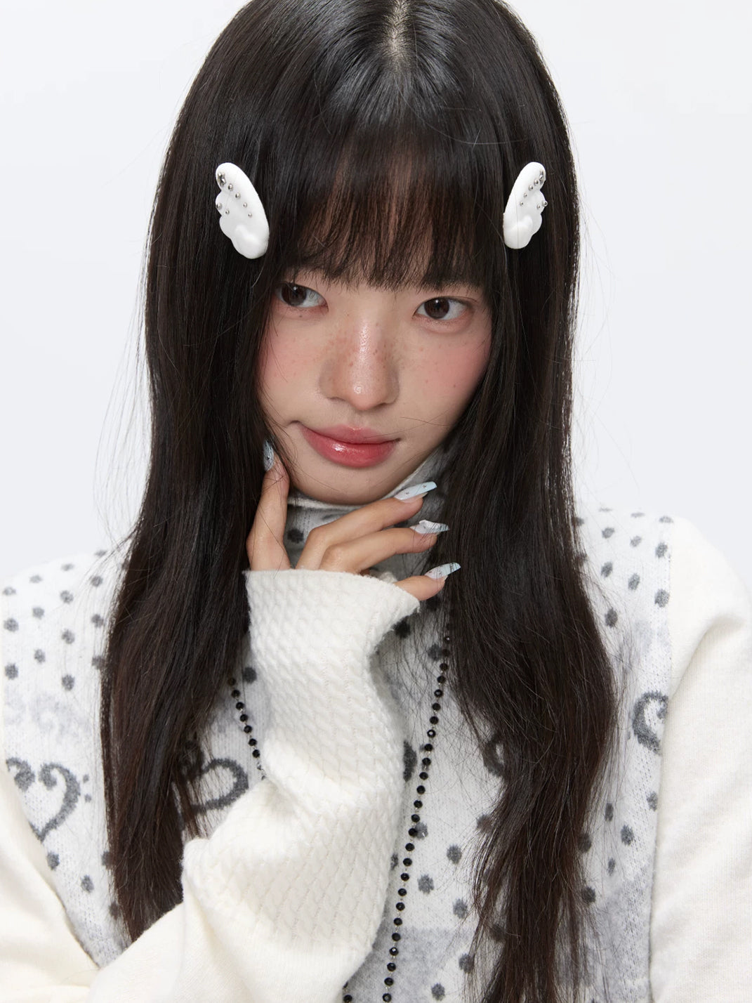 White Flocked Wing Hair Clip Pair — product view 5