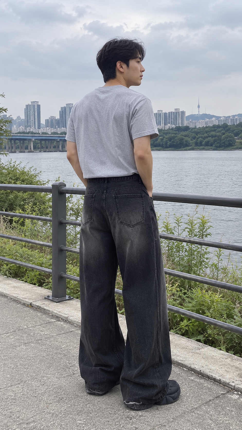 AI-styled look: Wide-Leg Faded Black Denim Jeans — rear-view riverside outfit
